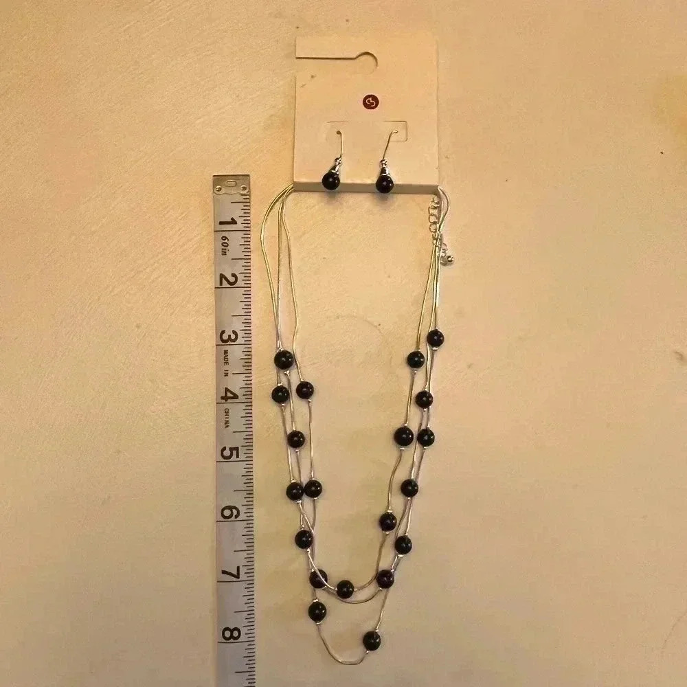 NWT Black and silver tiered necklace with matching earrings